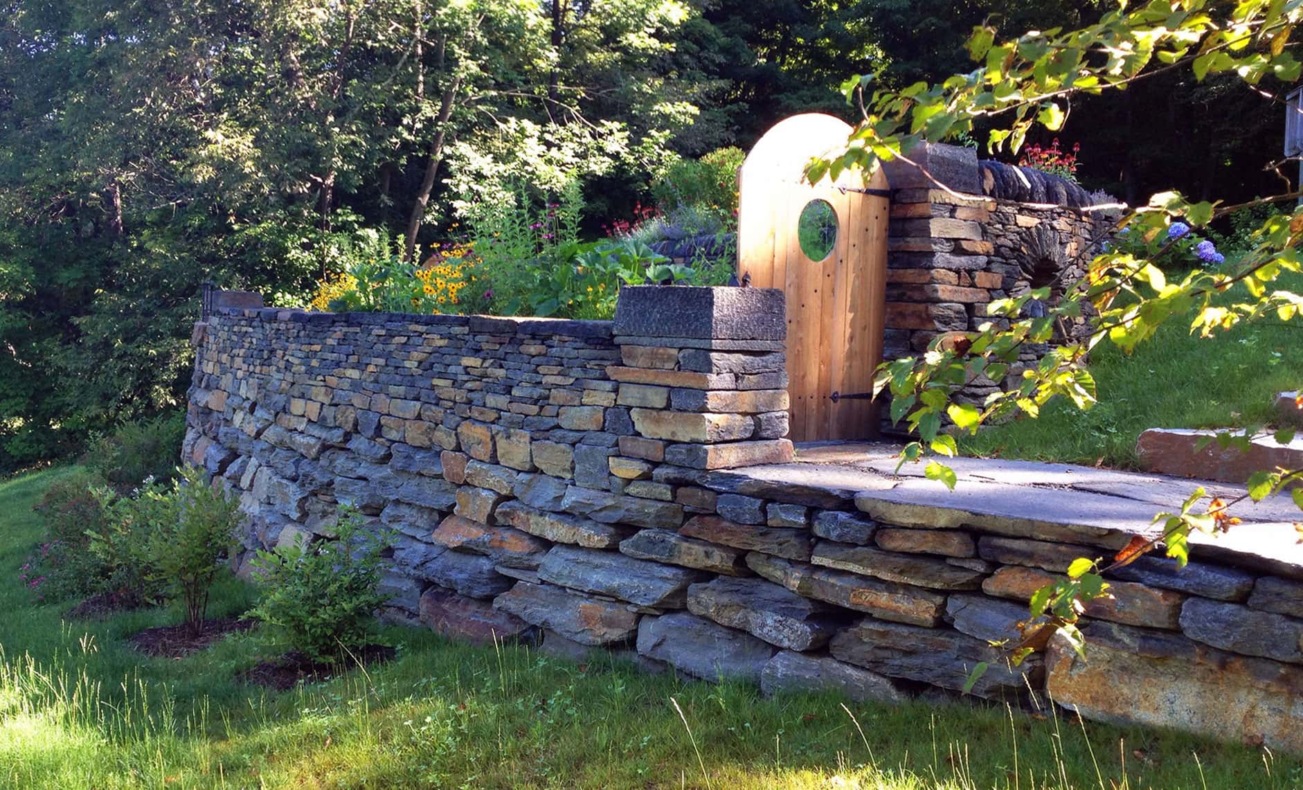 A special walled garden with custom stonework, gates and more.